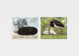 Eiropas vienotās sērijas pastmarkas šogad izceļ apdraudētās sugas – melno stārķi un Ziemeļu upespērleni 